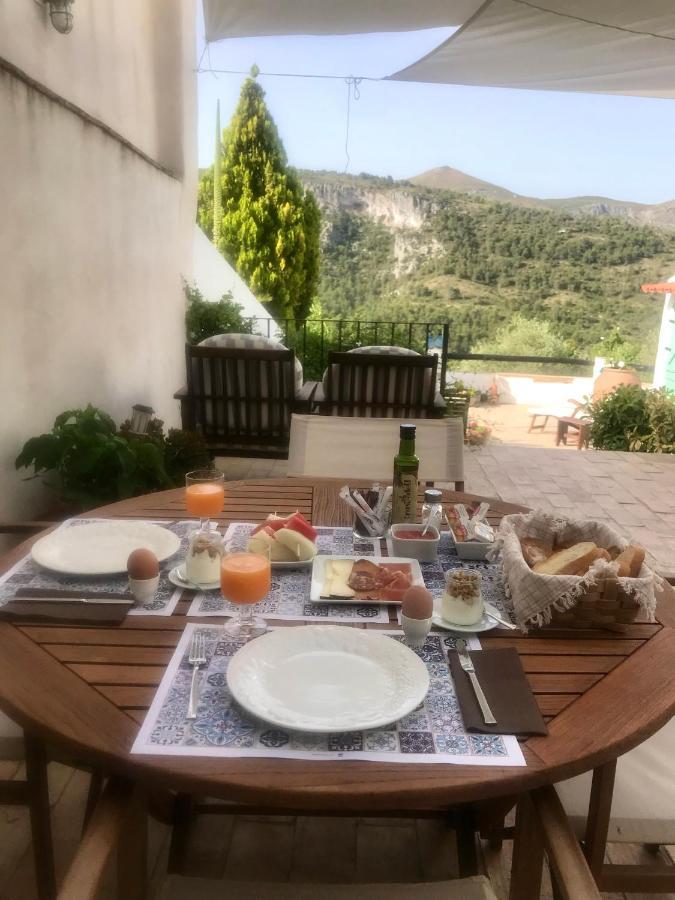 Al-Qandil Guest House Margarida Bagian luar foto